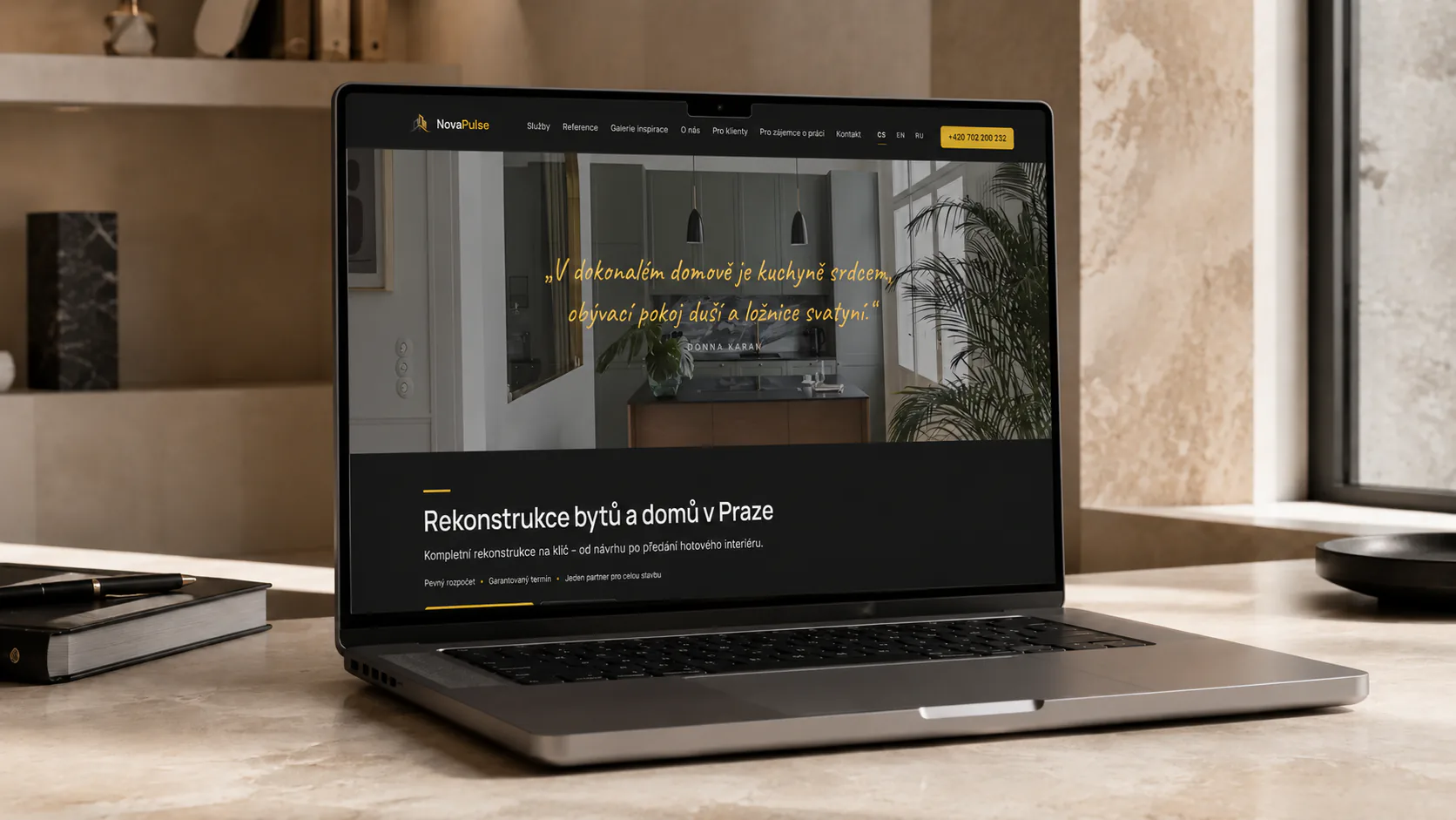 The Nova Puls homepage open on a laptop: a renovated Prague kitchen above the headline offering turnkey apartment and house renovation