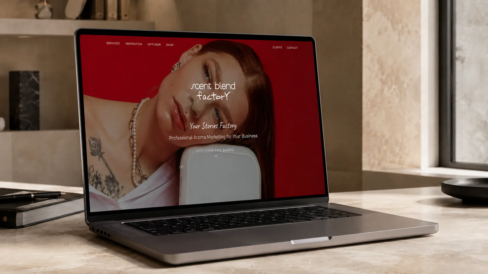 The Scent Blend landing page open on a laptop, introducing professional aroma marketing for business