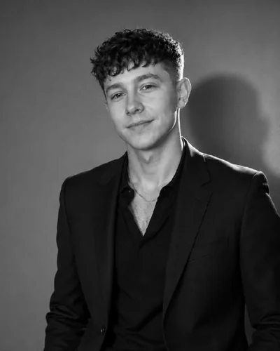 Roman Boiko, photographed against a black backdrop